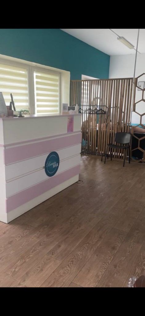 Beauty Bar reception with brand logo
